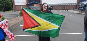 Alex Hopton shows her support for Leon Gordon with the Guyanese flag
