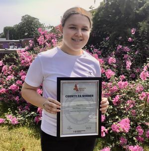 Grace Gallagher-Kennett with her award