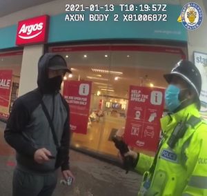 The officer asks Butler why he is in Birmingham