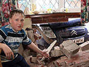 Supporting image for story: Car smashes into house in the wet