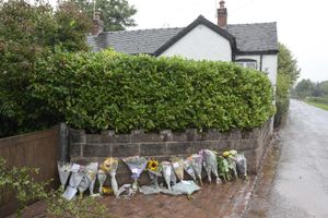 Flowers left at the scene. Photo: SnapperSK