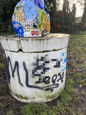 Graffiti on the sculpture, located near the Cartway
