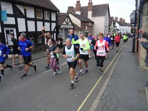 Derek and Susanne O’Connor sporting Mayfair colours along Church Stretton High Street
