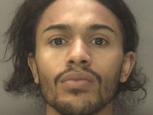 Supporting image for story: Gunman jailed for 18 years over double shooting and armed robbery