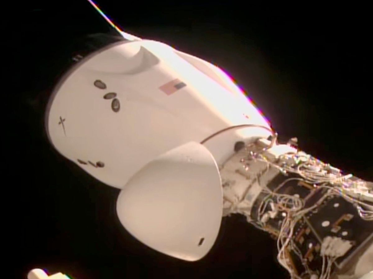 SpaceX delivers new crew to orbiting station in just 15 hours