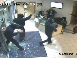 Supporting image for story: Shocking images in Lichfield robbery by masked gang of 17