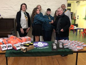 Supporting image for story: 1st Kington Scouts presented with equipment by local walking group.