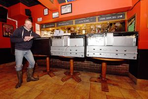 Ollie Parry, owner of The Salopian Bar, Shrewsbury, pictured surveying the damage to pub in March