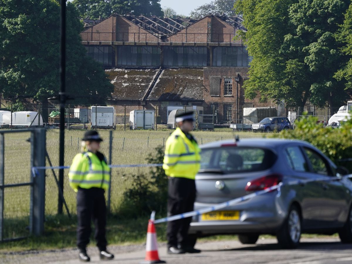 Two firefighters and member of public dead following large fire at ex-RAF base