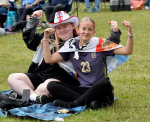 England fans watch the big match on the giant screen at Telford Town Park