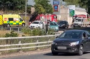 Emergency services at the scene near the Greyhound Roundabout after a vehicle crashed into barriers