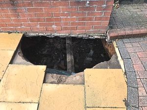 Supporting image for story: Sinkhole opens outside Wednesbury home