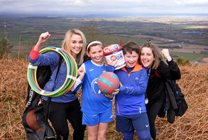 Pupils Kelsey Masefield, aged 11 and Harry Hindley, aged 8, from Newdale Primary School, get set for the event with staff Lily Jones and Alice Huda.