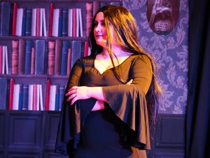 Amelie Hepworth as Morticia Addams