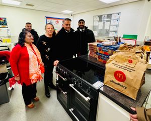 Left to right: Mrs Raj Kamal, Sanjeev Kumar of Green Lanes Tasty Bites, Councillor Sally Green (Lab, Blakenhall) and Ash Raju, McDonald's Penn Road. 