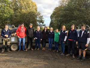Supporting image for story: Log lug boosts young farmers' charity total