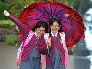 Supporting image for story: Sisters excited for the big return to school after six months at home
