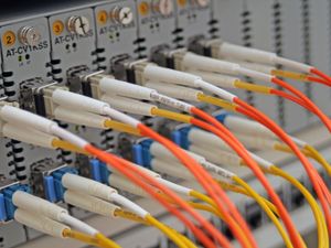 Fibre optic cables plugged in