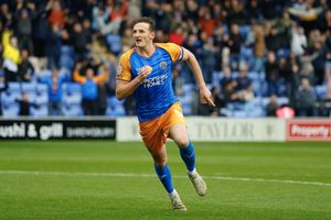 Will Boyle celebrates after heading home to give Shrewsbury Town the lead over Crawley Town