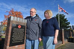 Paul and Chris Bott at Moxley War Memorial where four new plaques have been added.