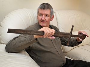 Mark Lawton with the sword