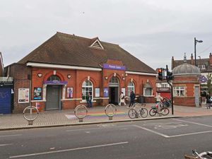 Supporting image for story: Police hunt for suspect who vandalised Pride flags outside station