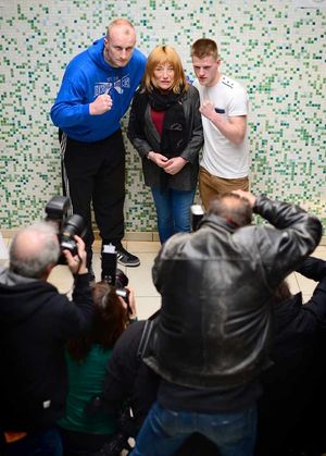 The press turn out for 'the Maloney factor' with Jones (right) enjoying the rub.