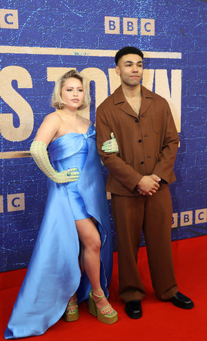 Eve Austin and Levi Brown strike a pose on the red carpet. Photo: Phil Blagg Photography.