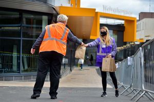 Facemasks being handed out at Wolverhampton Railway Station