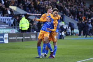 Luca Hoole of Shrewsbury Town celebrates after scoring a goal to make it 2-0