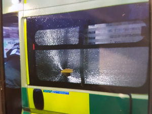 Supporting image for story: Ambulance smashed as man chases paramedics and attacks police officer