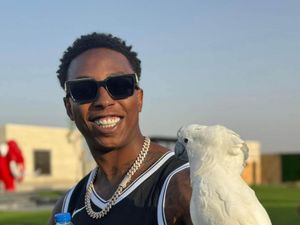 Supporting image for story: Rapper jailed for murdering father in front of young son in barber shop