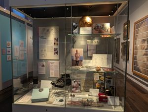 Cabinet of nostalgic items featured in the More Than Memories exhibition at Shrewsbury Museum.