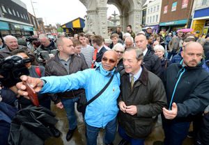 Mr Farage posed for pictures with Brexit Party supporters during his visit to the Black Country