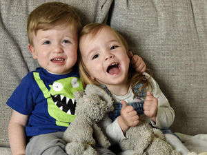 Supporting image for story: IN PICTURES: Mother shares touching tale of two-year-old helping twin with cerebral palsy