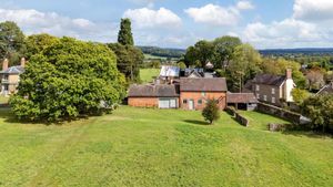 The property features a large red brick barn. Picture: Knight Frank/Rightmove