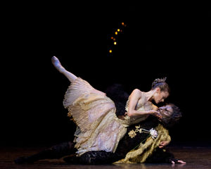 Delia Mathews as Belle and Iain Mackay as the Beast; photo Caroline Holden