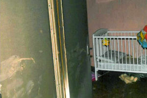 A 13-month-old child had to be rescued from inside the burning house