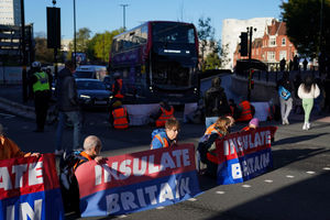 Protesters from Insulate Britain blocking Great Charles Street Queensway in Birmingham