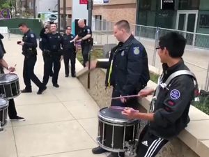 Supporting image for story: Watch a cop surprise his fellow officers with a novel use of his police baton