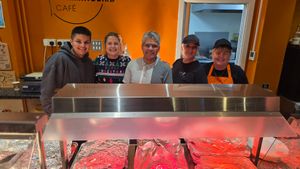 From left are Sam Leal, Debbie Molton, Krish Leal, Sharon Dean and Avril Davies, during the festive meal at The Hummingbird Cafe.