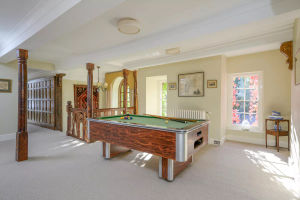 There is even a pool table in one of the utility rooms