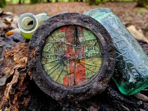 Supporting image for story: Watch the moment metal detectorist finds 100-year-old car tax disc in Oswestry