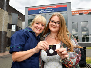Supporting image for story: Award-winning nurse passes on watch to niece, 18, set to follow in her footsteps
