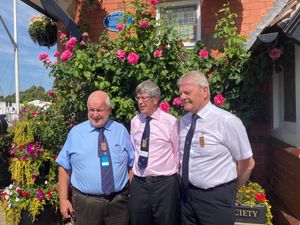 from left, Chairman Maelor Owen, Michael Burton a vice-president and president Terry Jones 
