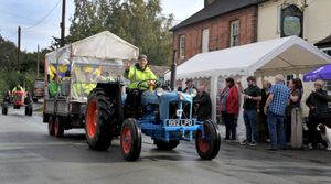 Plenty of people turned out in Withington to see the tractor run finish