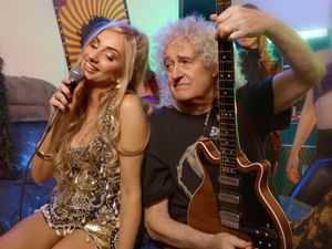 Supporting image for story: Sir Brian May shreds guitar in the music video for Talia Dean’s new song