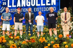 Lee Woods, John O'Grady, Adam Kelly, Jonny Helm, Mark Brandreth and David Hennigan on stage at the Llangollen International Eisteddfod in July 2025.