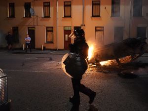 Supporting image for story: PM ‘utterly condemns’ second night of violence after 17 officers injured in NI