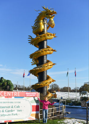 Rosie White from the British Ironwork Centre with the spectacular new sculpture.